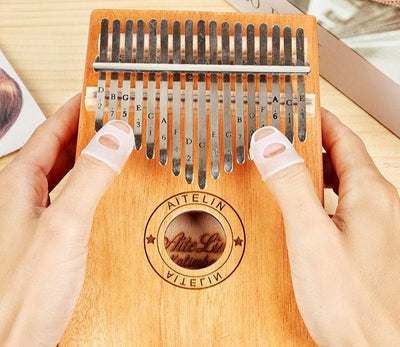 Accessoires pour piano à pouce Kalimba Tassel / Housse de protection des doigts / Chaîne de trémolo